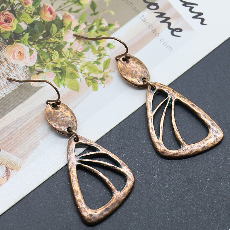 Retro hollow alloy earrings long earrings