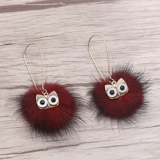 Otter hairball owl long earrings