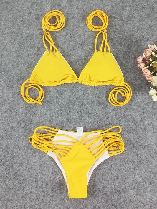 Sexy Hollow Bandage Split Type Bikini Swimsuit