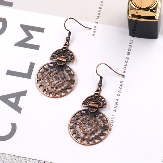 Hollow round alloy earrings