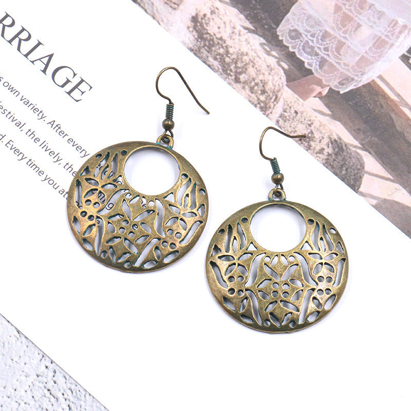 Alloy creative flower hollow vintage earrings