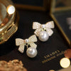 S925 silver needle elegant bow pearl earrings