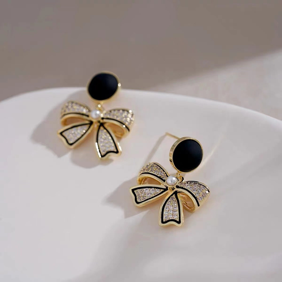 Black bow earrings